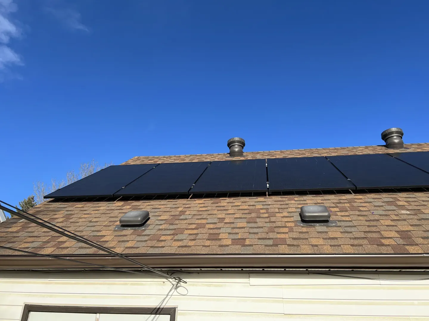 Edmonton home with solar panels visible from the street