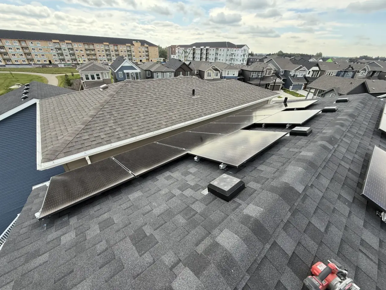 Solar panel alignment during installation on an Edmonton rooftop