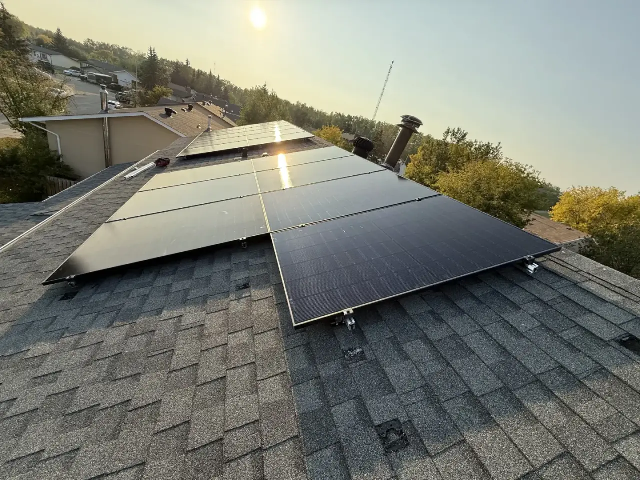 Edmonton-area solar panel installation at golden hour