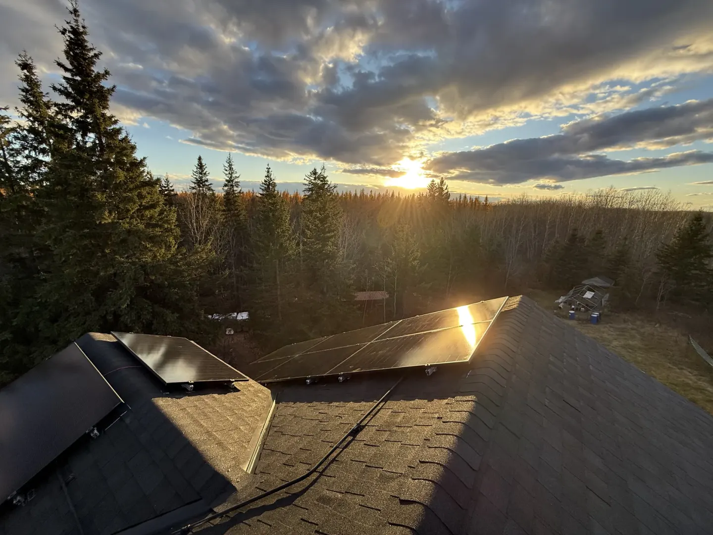 Solar panels at sunset on an Alberta property